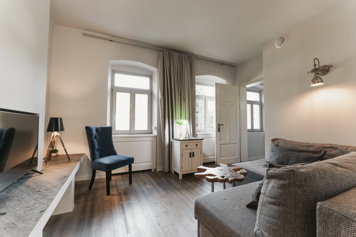 Hotelzimmer Classic Rooms im Boutique Hotel Heidelberg. In Neuenheim für 1 - 2 Personen. Dunkles Doppelbett.